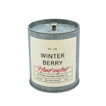 Candle with 'Winter Berry' label on a white background